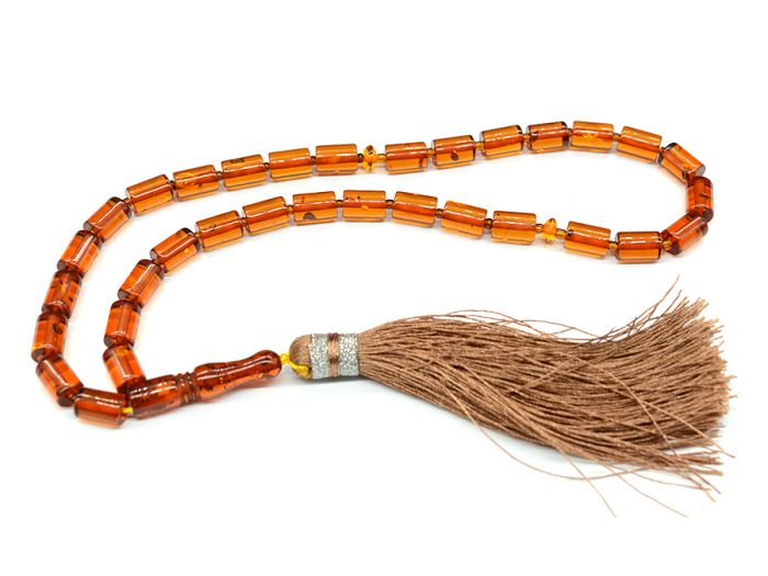 Artificial amber rosary cylinder 7*10mm cognac, 35cm.