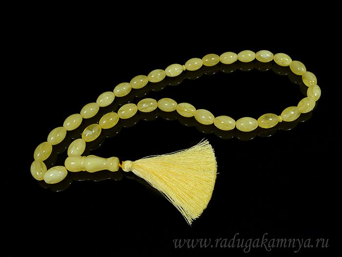 Artificial amber rosary oval 13*19mm milk, 63cm.