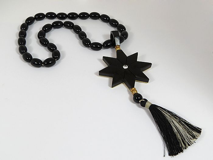 Rosary of ebony and bone "Star with Jesus" olives 10*14mm, 50cm